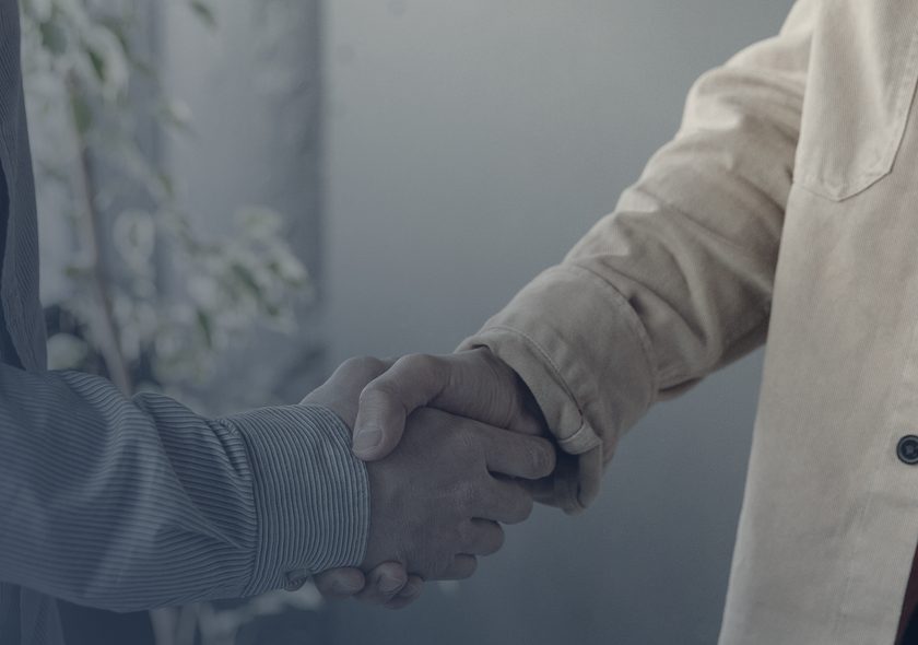 Two people shaking hands